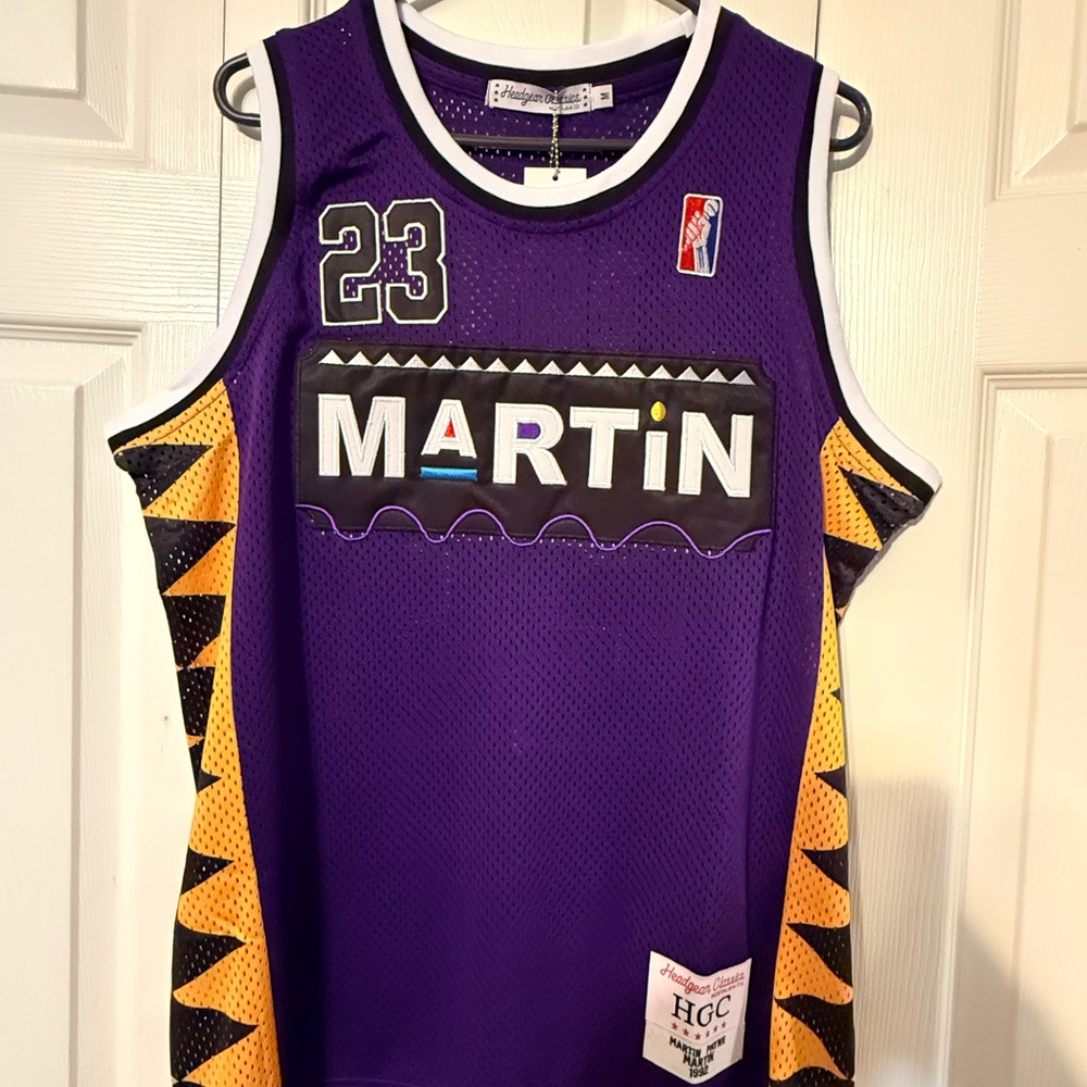 Medium. Purple and White Martin Jersey.